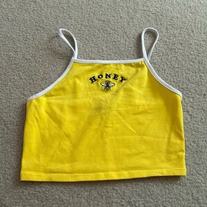 Forever 21 cropped yellow tank top.